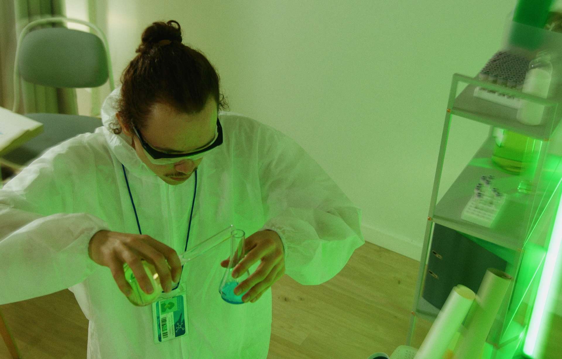 a chemist mixing liquids