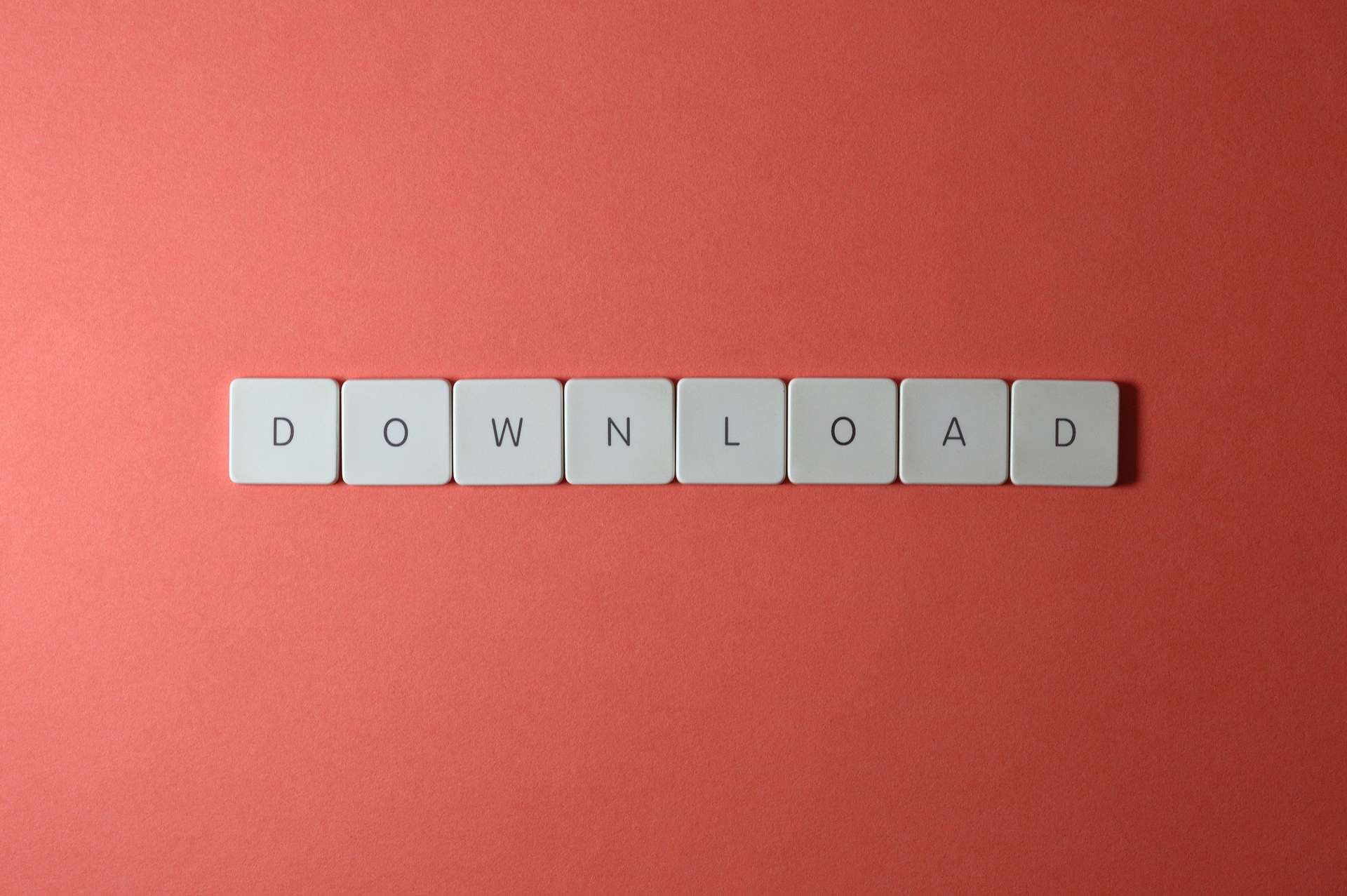the word download in small tiles